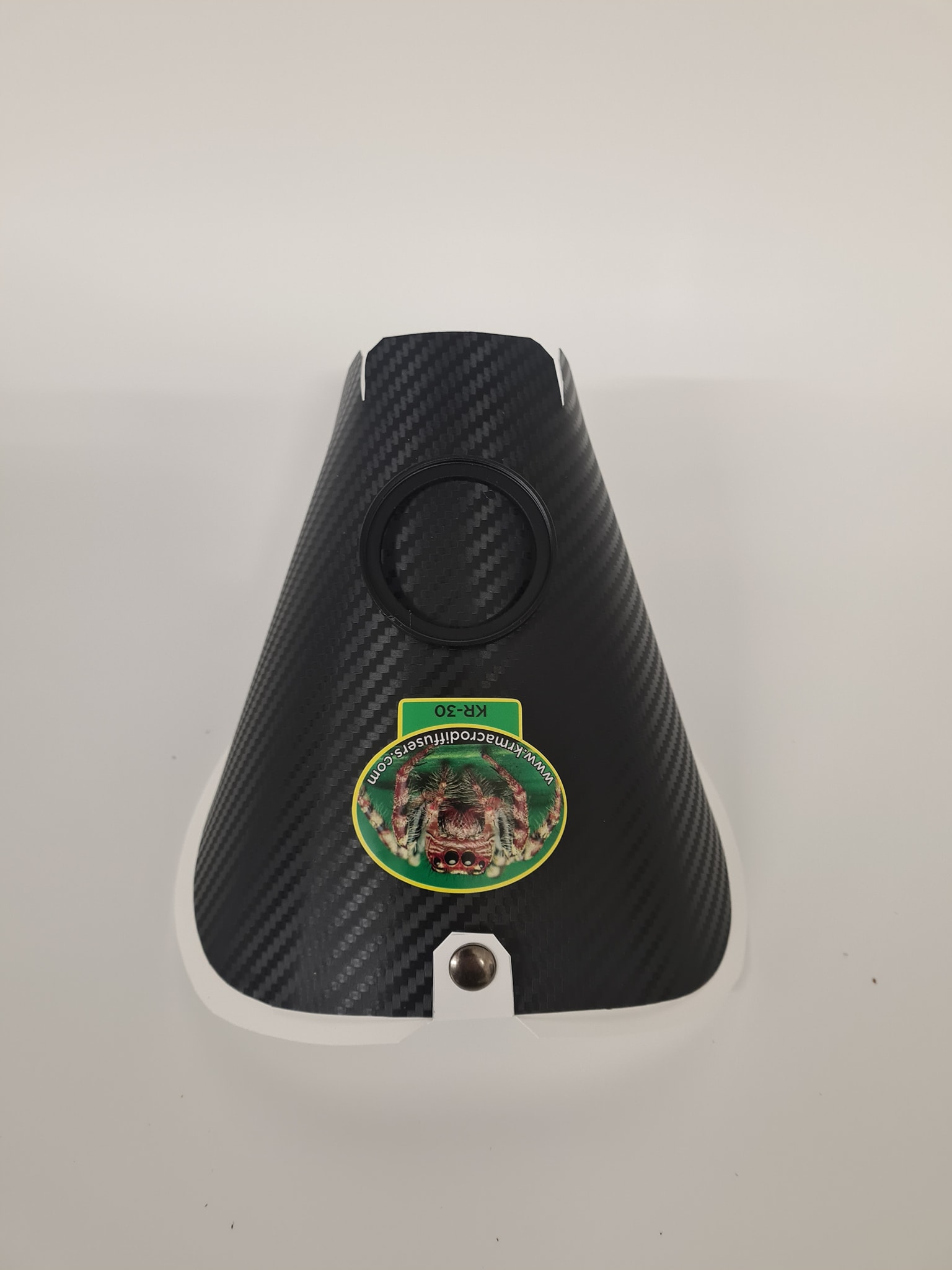 KR-30 carbon fibre matte black top view showing the raynox storage ring.